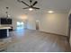 Spacious living room with high ceilings and wood-look floors at 262 Locust Rd, Ocala, FL 34472