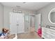 Bright bedroom with double doors and ample closet space at 2936 Ne 43Rd Rd, Ocala, FL 34470