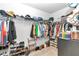 Large walk-in closet with ample hanging and shelving space at 2936 Ne 43Rd Rd, Ocala, FL 34470