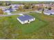 Aerial view of a house on a spacious lot in a residential neighborhood at 3792 Sw 166Th Pl Rd, Ocala, FL 34473