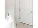 Bathroom with shower and double doors at 3792 Sw 166Th Pl Rd, Ocala, FL 34473