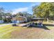 Covered patio, gazebo with seating, and open space for entertaining at 3899 Se 80Th St, Ocala, FL 34480