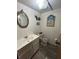 Simple bathroom with a toilet and vanity at 3899 Se 80Th St, Ocala, FL 34480