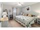 Guest bedroom with a king-size bed and calming decor at 3899 Se 80Th St, Ocala, FL 34480