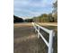 White post and rail fence borders the property at 3899 Se 80Th St, Ocala, FL 34480