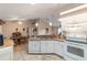 Kitchen featuring granite countertops and white appliances at 3899 Se 80Th St, Ocala, FL 34480