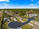 Aerial view of a single-Gathering home in a quiet residential community at 4 Diamond Cove Ct, Ocala, FL 34472