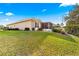 House exterior showcasing a large backyard at 4 Diamond Cove Ct, Ocala, FL 34472