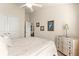 Guest bedroom with a queen bed and built-in storage at 4 Diamond Cove Ct, Ocala, FL 34472