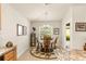 Cozy dining area with round table and four chairs, near kitchen at 4 Diamond Cove Ct, Ocala, FL 34472