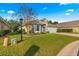 House exterior showcasing a well-maintained lawn and landscaping at 4 Diamond Cove Ct, Ocala, FL 34472