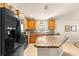 Modern kitchen with black appliances and granite countertops at 4 Diamond Cove Ct, Ocala, FL 34472