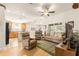 Living room with hardwood floors and open view to kitchen at 4 Diamond Cove Ct, Ocala, FL 34472