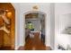 Elegant entryway with hardwood floors and arched passage at 4020 Se 9Th Ave, Ocala, FL 34480