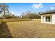 Expansive backyard with wood fence, ideal for outdoor activities and privacy at 5200 Nw 54Th Pl, Ocala, FL 34482