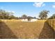 Large fenced backyard offering ample space for recreation and entertainment at 5200 Nw 54Th Pl, Ocala, FL 34482