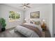 Inviting bedroom with natural light, neutral decor, and comfortable furnishings at 5200 Nw 54Th Pl, Ocala, FL 34482