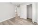 Bedroom featuring wood floors and closet offers convenience and style at 55 Locust Loop Cir, Ocala, FL 34472