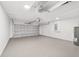 Spacious garage with automatic door and ample room for storage and vehicles at 55 Locust Loop Cir, Ocala, FL 34472