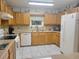 Bright kitchen, offering ample counter and cabinet space at 5555 Sw 107Th St, Ocala, FL 34476