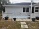 Concrete patio with potted plants and walkway at 5555 Sw 107Th St, Ocala, FL 34476