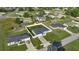 Aerial view of a neighborhood, showcasing a newly built home at 7 Hemlock Radial, Ocala, FL 34472