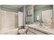 Bathroom with a tub, shower, marble-look vanity, and coastal decor at 7235 Se 113Th Ln, Belleview, FL 34420