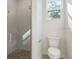 Bathroom with a walk-in shower and pebble floor at 7323 Sw 204Th Ave, Dunnellon, FL 34431