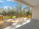 Deck with access to a large grassy backyard at 7323 Sw 204Th Ave, Dunnellon, FL 34431