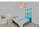 Bedroom with ceiling fan and a queen-size bed at 7885 Sw 202Nd Ave, Dunnellon, FL 34431