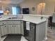 Kitchen island with sink, dishwasher and ample counter space at 8187 Sw 60Th Ter, Ocala, FL 34476