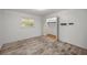 Simple bedroom with closet and wood-look floors at 820 Ne 42Nd Ter, Ocala, FL 34470