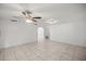 Spacious living room with tile floors and high ceilings at 820 Ne 42Nd Ter, Ocala, FL 34470