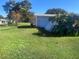 A spacious backyard offering ample space for outdoor activities and gardening at 8973 Sw 101St Ln, Ocala, FL 34481