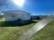 Exterior of the property surrounded by lush green lawn at 8973 Sw 101St Ln, Ocala, FL 34481