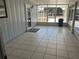 Tiled screened porch with door access at 8973 Sw 101St Ln, Ocala, FL 34481