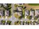 Aerial view of a residential neighborhood with houses and streets at 9211 Sw 66Th Loop, Ocala, FL 34481