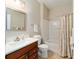 Clean bathroom with a shower/tub combo and updated vanity at 9211 Sw 66Th Loop, Ocala, FL 34481