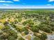 Wide aerial view showing the property and neighborhood at 10557 Sw 62Nd Ct, Ocala, FL 34476