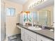 Bathroom with shower and vanity at 10557 Sw 62Nd Ct, Ocala, FL 34476