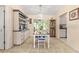 Dining area with table and chairs, adjacent to kitchen at 10557 Sw 62Nd Ct, Ocala, FL 34476