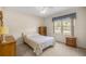 Bedroom with ceiling fan, window and dresser at 11462 Sw 82Nd Court Rd, Ocala, FL 34481