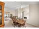 Dining room with wooden table and chairs near kitchen at 11462 Sw 82Nd Court Rd, Ocala, FL 34481