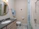 Clean bathroom with shower/tub combo, vanity, and tile floor at 12330 Nw 35Th St, Ocala, FL 34482