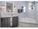 Bathroom boasts a large corner tub and updated vanity at 12330 Nw 35Th St, Ocala, FL 34482