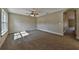 Well-lit bedroom with window and carpet flooring at 14269 Se 27Th Ct, Summerfield, FL 34491