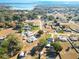 Aerial view of neighborhood and lake at 14320 Se 96Th Ct, Summerfield, FL 34491