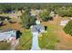 Aerial view of a house with a pool and large backyard at 14320 Se 96Th Ct, Summerfield, FL 34491