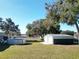 Large backyard with above ground pool and detached garage at 14320 Se 96Th Ct, Summerfield, FL 34491