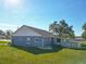 Large backyard with above ground pool and house view at 14320 Se 96Th Ct, Summerfield, FL 34491